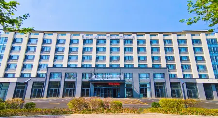 Silver Plaza Joy Select Hotel (Penglai Branch) Отели рядом с достопримечательностью «Haishi Park»