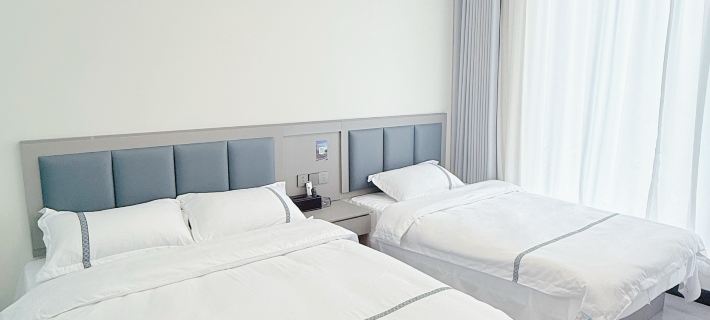 Baquanxia Qinxuan Homestay โรงแรมในหูกวน