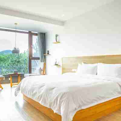 青島天泰山樂愛溫泉藝術飯店 Rooms