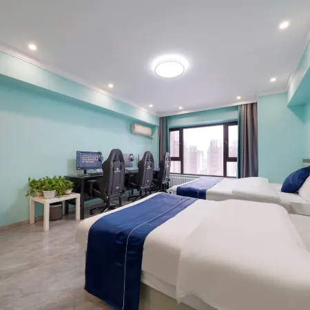 Summer Yanyan E-sports Apartment (Harbin Haxi Wanda Plaza High-speed Railway Station)