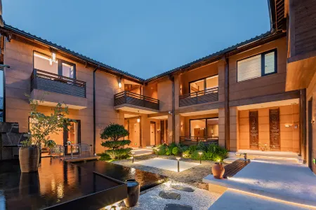 DaLi ShaXi Hotel Nandana Отели в г. Цзянчуань