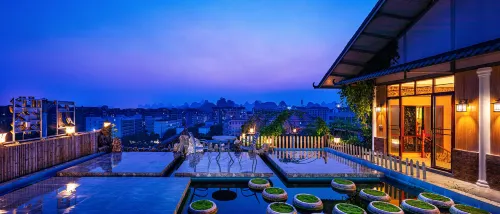 A thousand purple and red roof garden hotel (Guilin Liangjiang Sihu Scenic Area) - románticos