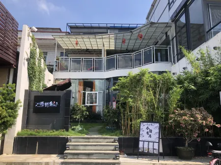 Zhaoqing Shiyanshe Homestay Отели рядом с достопримечательностью «Qixingyan Archway Square»