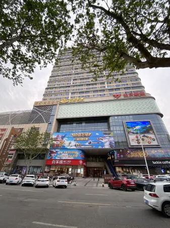 Qiyue Qingya Apartment Hotel (Longkou Boshang Shopping Plaza) Отели рядом со станцией Longkoushi Railway Station