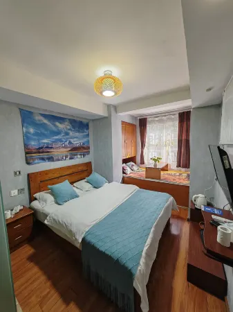 Kangding Jiudu Chinese Inn Отели рядом с достопримечательностью «Princess Bridge»