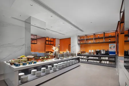 Hampton by Hilton Fuzhou Wusi Road Отели рядом с достопримечательностью «Fujian Agriculture and Forestry University Gymnasium»