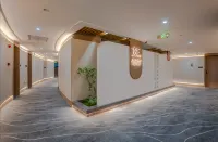 Gushi Yibai International Hotel - 3-stjärniga