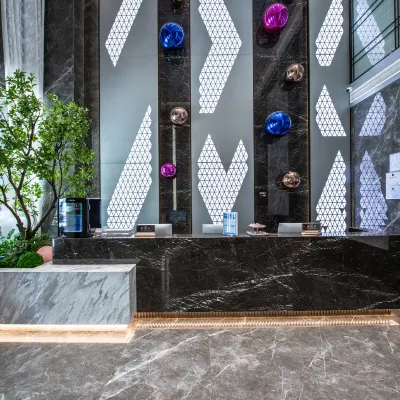 Laisidun Hotel (Guangzhou Haizhu Wanda Plaza Yijing Road Subway Station Branch) Hotel berhampiran Stesen Datang