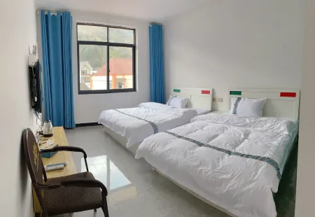 Pengzhou Dengfenglai Boutique Inn Отели рядом с достопримечательностью «Bailu Monastery»