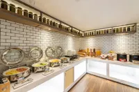 โรงแรมอีชาร์ม (เมืองโบราณเฉียนโจว รัฐบาลจี๋โซ่ว) - พร้อมอาหารเช้า