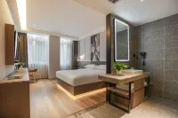 Guangzhou Jiulong Hotel (Fenggang Pedestrian Street Wisdom New City Branch) Hotels near China Fenggang Organic Food City
