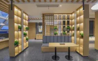 Qingmu Platinum Hotel (Changxing East fish square eight hundred companion store) - sarapan