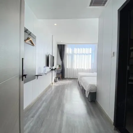 Qixia Xiangange Business Hotel