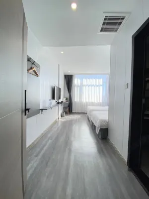 Qixia Xiangange Business Hotel