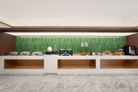 Magnotel Hotel (Dezhou Qihe Quancheng Oulebao Yellow River Water Street) - sarapan
