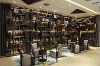 Kunlun Leju Business Hotel (Xinxiang Huixian) - parkir