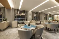 DeXin JunTing Hotel (Wenzhou South Railway Station Yintai Department Store Branch)