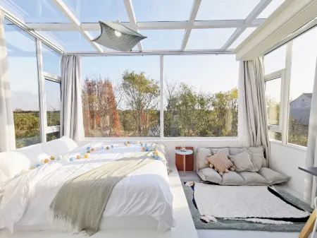 Shanghai ruochu designer Guesthouse Отели рядом с достопримечательностью «Shanghai Wild Animal Park»