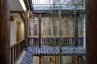 Dust and Hustle Weiyuan Designer Zen Homestay (Chongzhou Jiezi Ancient Town Branch) - موقف سيارات