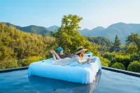 Anji Yieryi. Coco Garden Homestay Hotels in Hello Kitty Park
