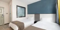 Hello Light Hotel (Suining traditional Chinese medicine hospital store) - Haluo Elegant Exceptional Twin Room