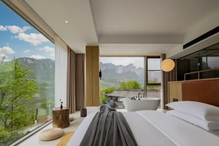 Enshi No.7 Valley Lodge Отели рядом с достопримечательностью «Yulong Crevice»