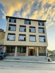 Bailongjiang Hotel (Langmusi Scenic Area) Hotels near Red Stone Cliff