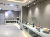 hecheng Hotel - servizio colazione