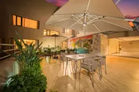 Meihao EZZI Hotel (Yuxi Xinping Ethnic Square) - gimnasio