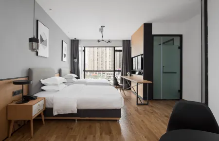 Huiyue Design Hotel (Renshou City Wetland Park store) Отели рядом с достопримечательностью «YiHe ChunXi BuXingJie»