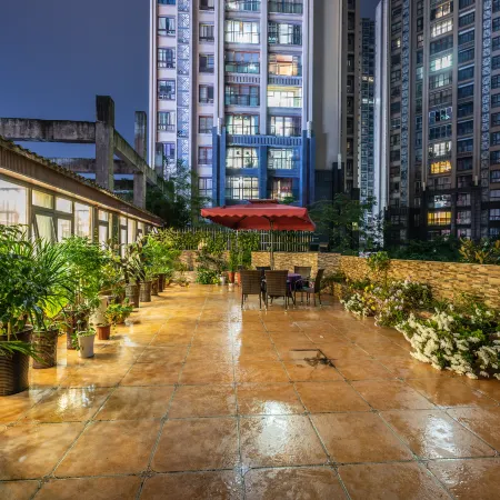 Quxian Garden Business Hotel (Qianrenli Wealth Center Branch)