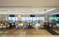 Li Cai Tian Qi Hotel