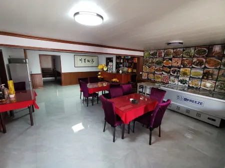 Yikang Farm House Отели рядом с достопримечательностью «Minzu Square»