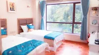 欣城商務賓館 香拉東吉聖山風景區附近的飯店