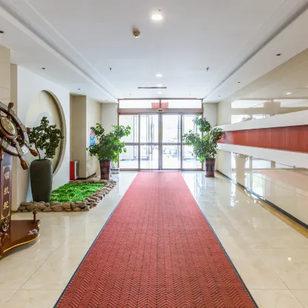 Huludao Ningzhe Hotel (Feitian Square) Отели в г. Хулудао