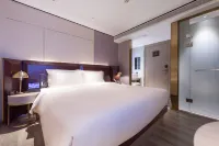 โรงแรมอีชาร์ม พลัส (สาขา เมืองมิตรภาพแสงแดด ไหโข่ว สวนเอเวอร์กรีน) - 4 ดาว