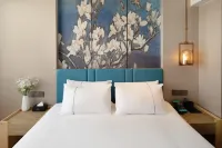 Magnotel Hotel (Xiangyang Ancient City Tanxi Road)