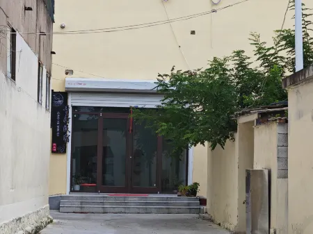 Weishan Lake Qinghe Homestay Отели в г. Вейшань