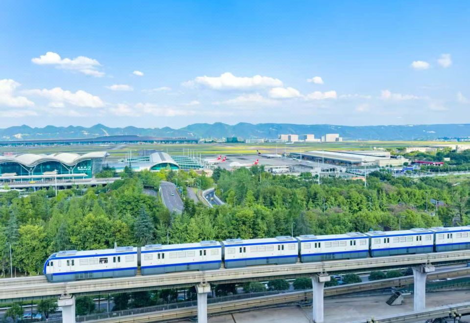 Chongqing Xiaoxiao Yuguang Homestay의 침실 전경