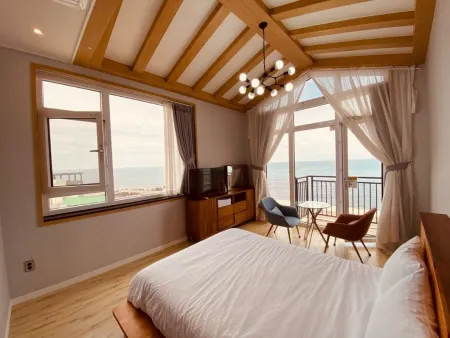 Jeju Beautiful Pension Отели рядом с достопримечательностью «Yongcheondonggul Cave»