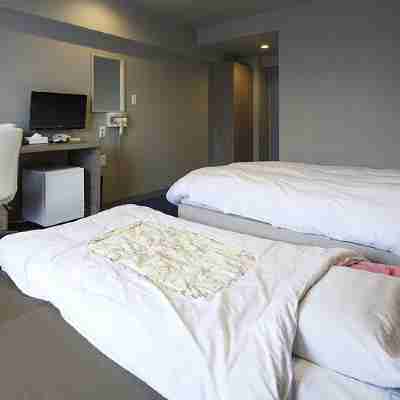 Business Hotel Takara Rooms