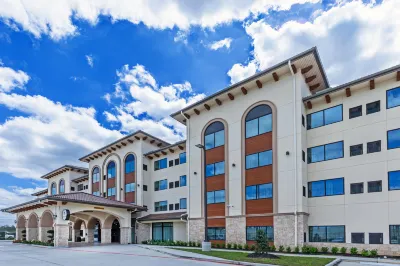 Hotel Indigo Spring – Woodlands Area Отели в г. Спринг