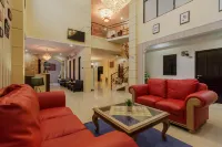 RedDoorz Plus Near Pantai Malalayang Manado Hotels in Mandolang