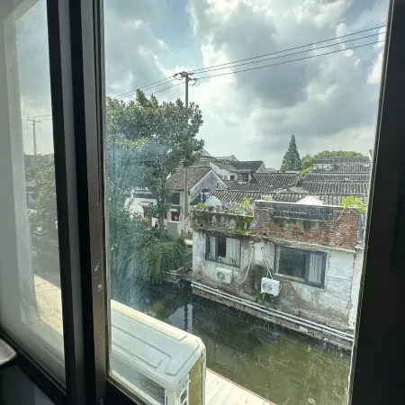 Zhenhe Homestay (Pingjiang Road Guanqian Street Branch)