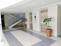 Spacious 36Sqm Studio with 65" TV Netflix Karaoke and Pool Access Near Airport and Samal Ferry Hotels in Panabo