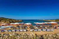 Mangia's Santa Teresa Sardinia, Curio Collection by Hilton - Beach