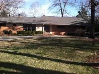 Mid-century modern ranch on Sedgefield Country Club golf course