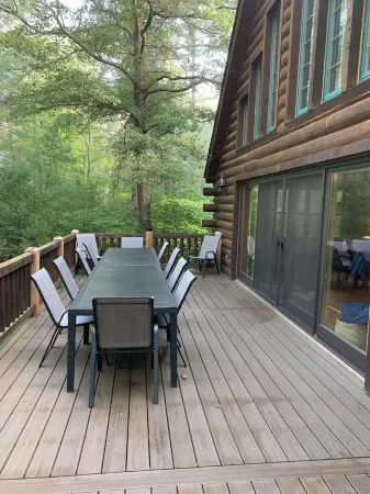 Exceptional log home on 9+ acres with frontage on Big St. Germain Lake