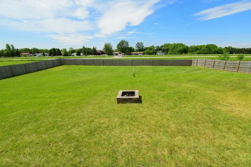 Three bedroom home on a large lot with a lake view