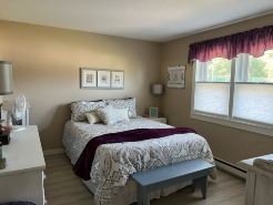 2 Bed/1 Bath Saunders Bay Gilford with boat slip. Walk to Meadowbrook for a show